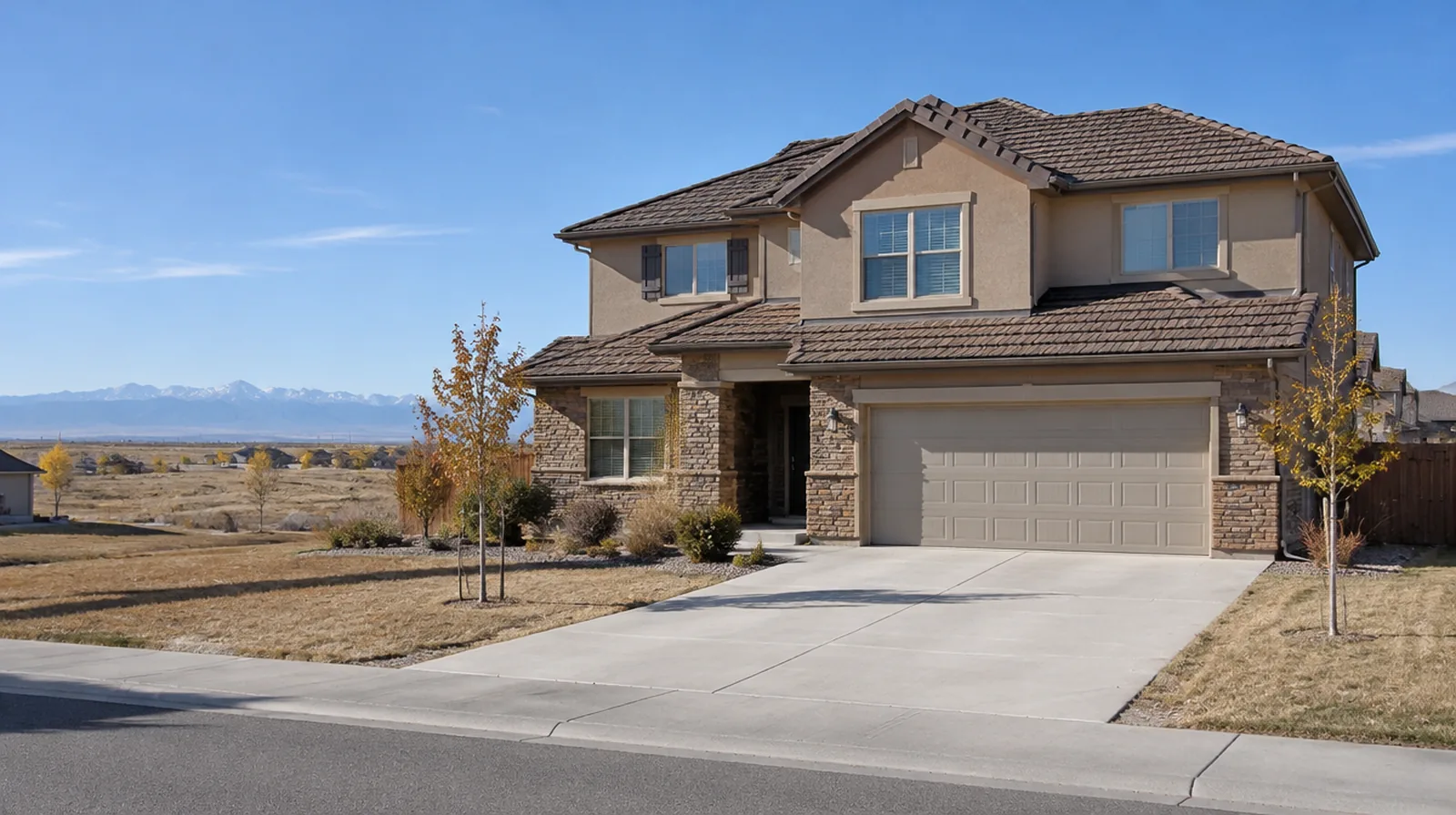 Stone-coated metal shake roof on a two-story home in Commerce City, CO
